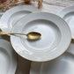 5 Assiettes creuses en porcelaine de Limoges blanches dorées