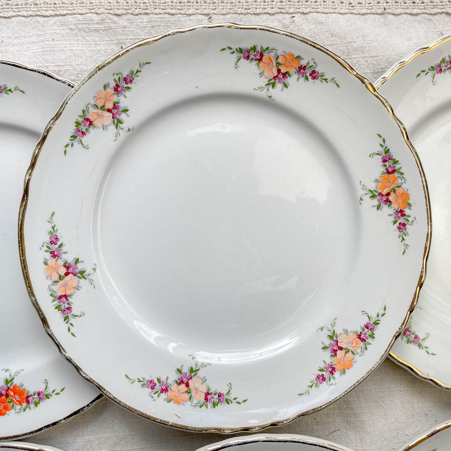 9 Petites assiettes vintage Moulin des Loups motif fleuries orange