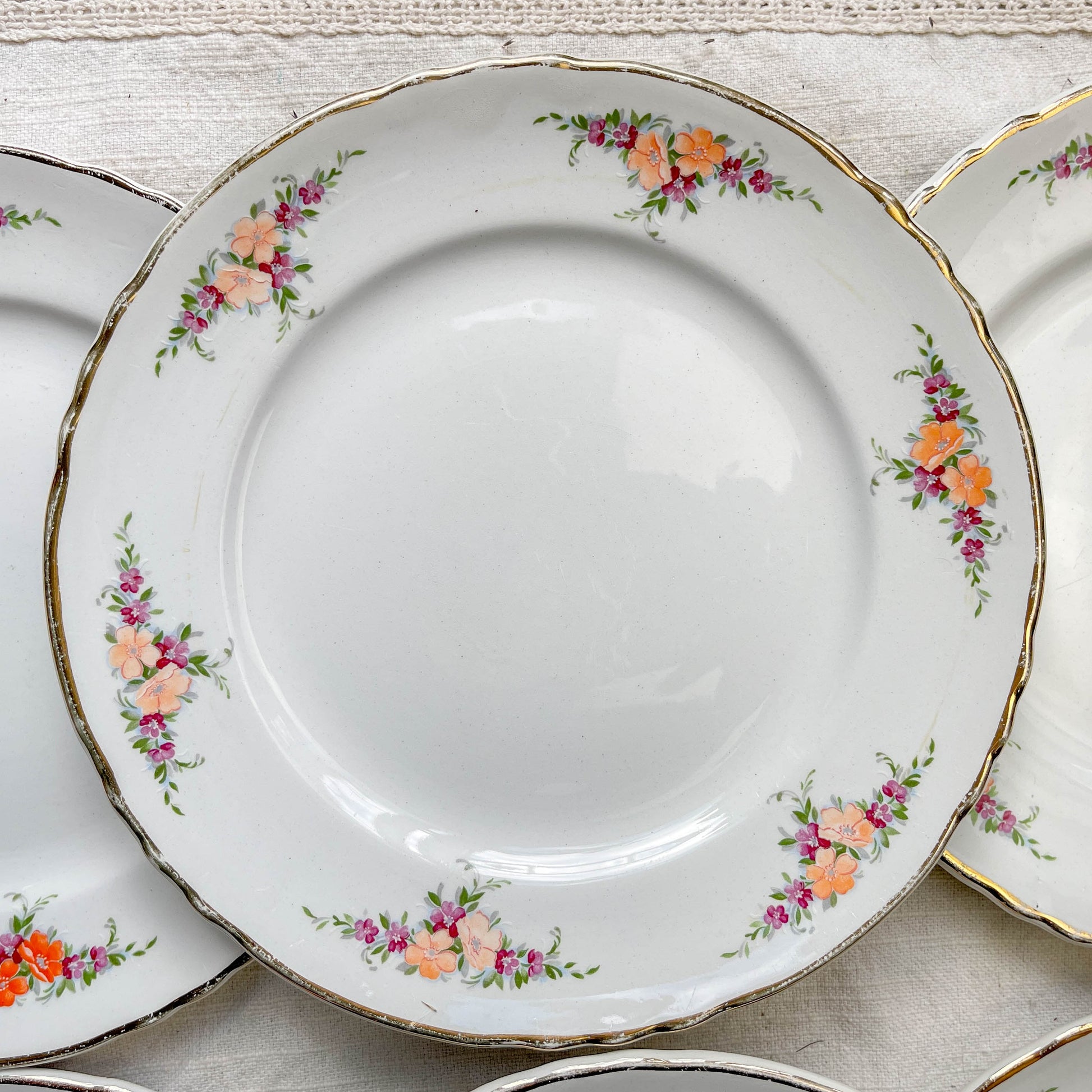 9 Petites assiettes vintage Moulin des Loups motif fleuries orange