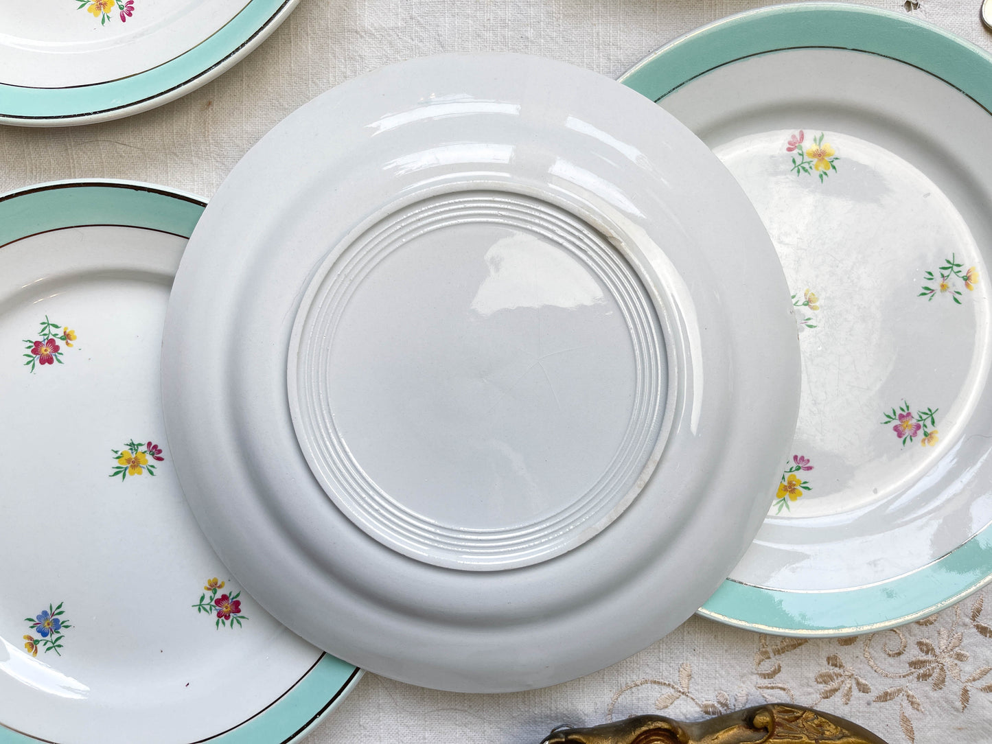 6 Vintage white and green floral porcelain dinner plates, Lunéville, 1950s.