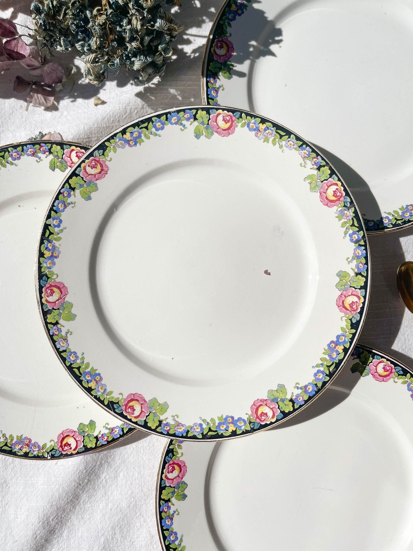 4 Small DIGOIN opaque porcelain plates with floral pattern "3984"