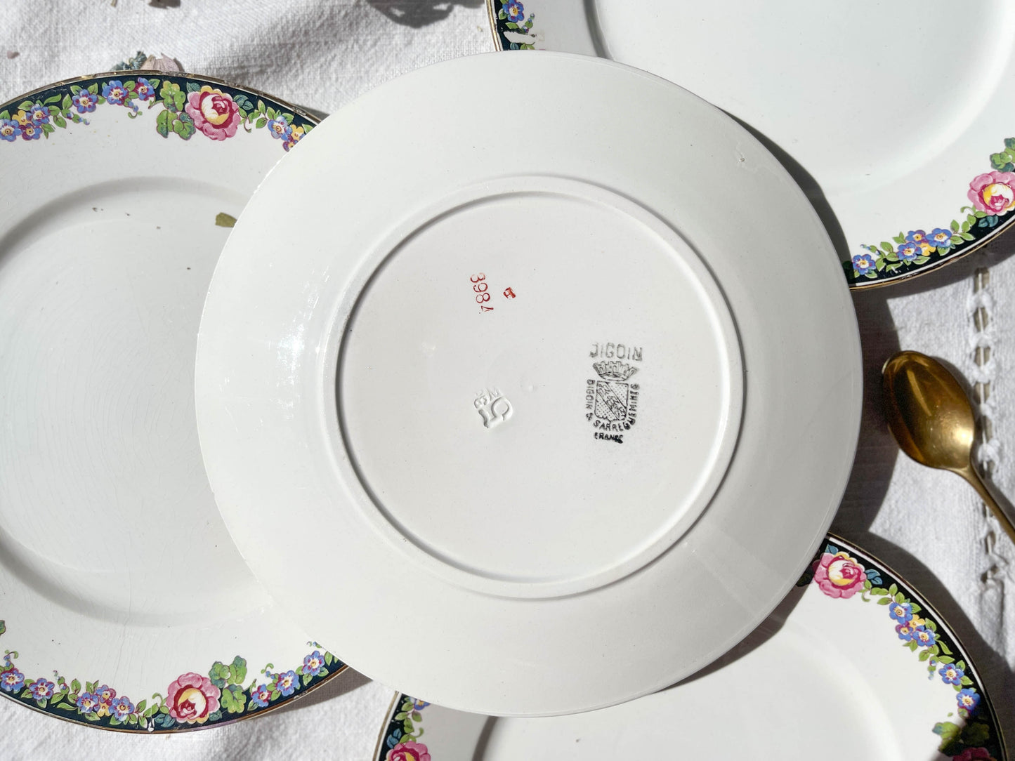 4 Small DIGOIN opaque porcelain plates with floral pattern "3984"