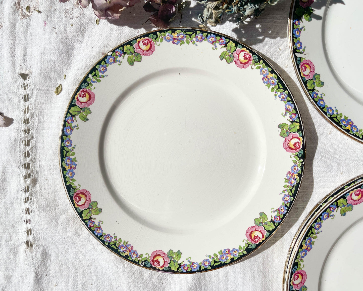 4 Small DIGOIN opaque porcelain plates with floral pattern "3984"