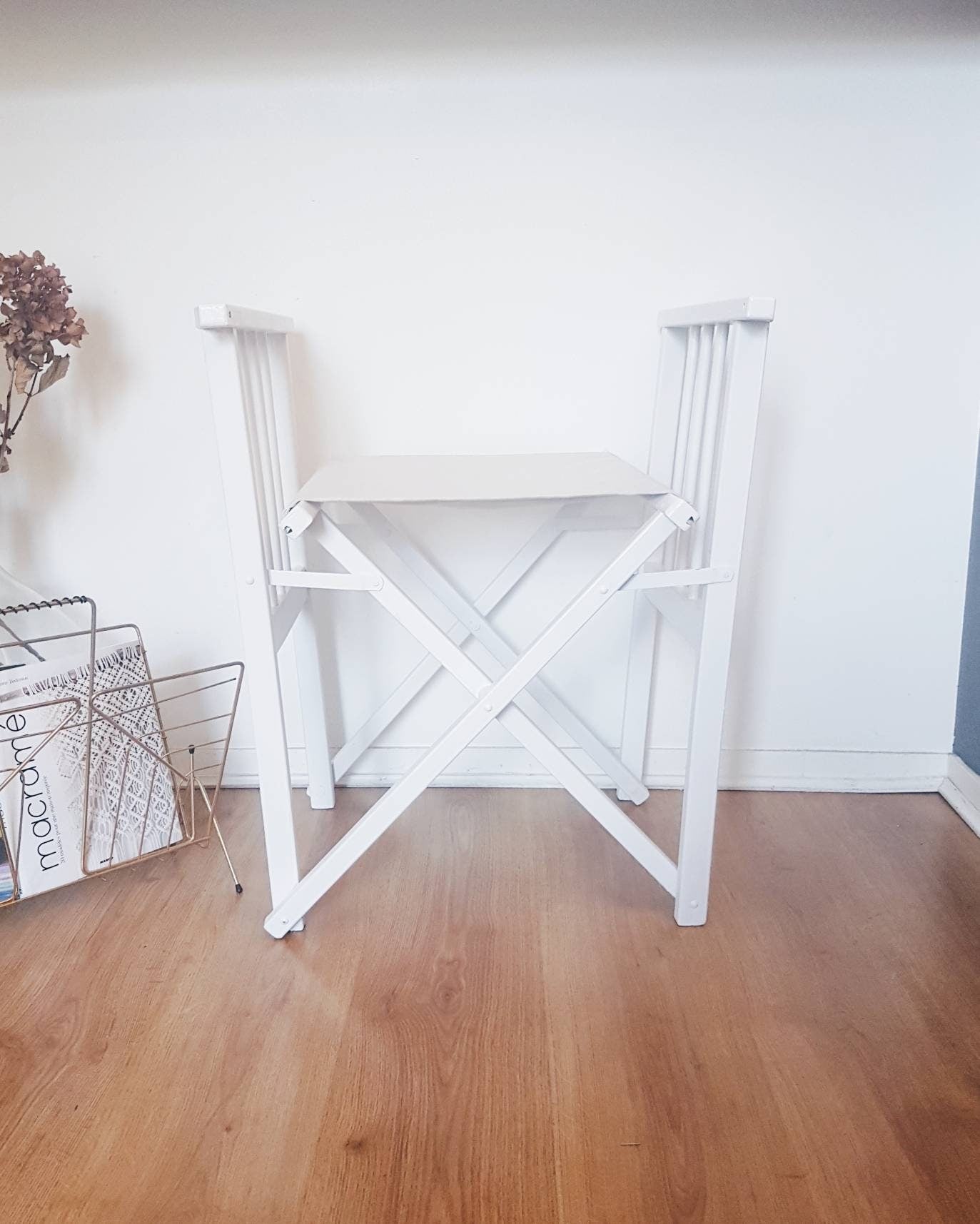 Chaise pliante vintage en bois blanc
