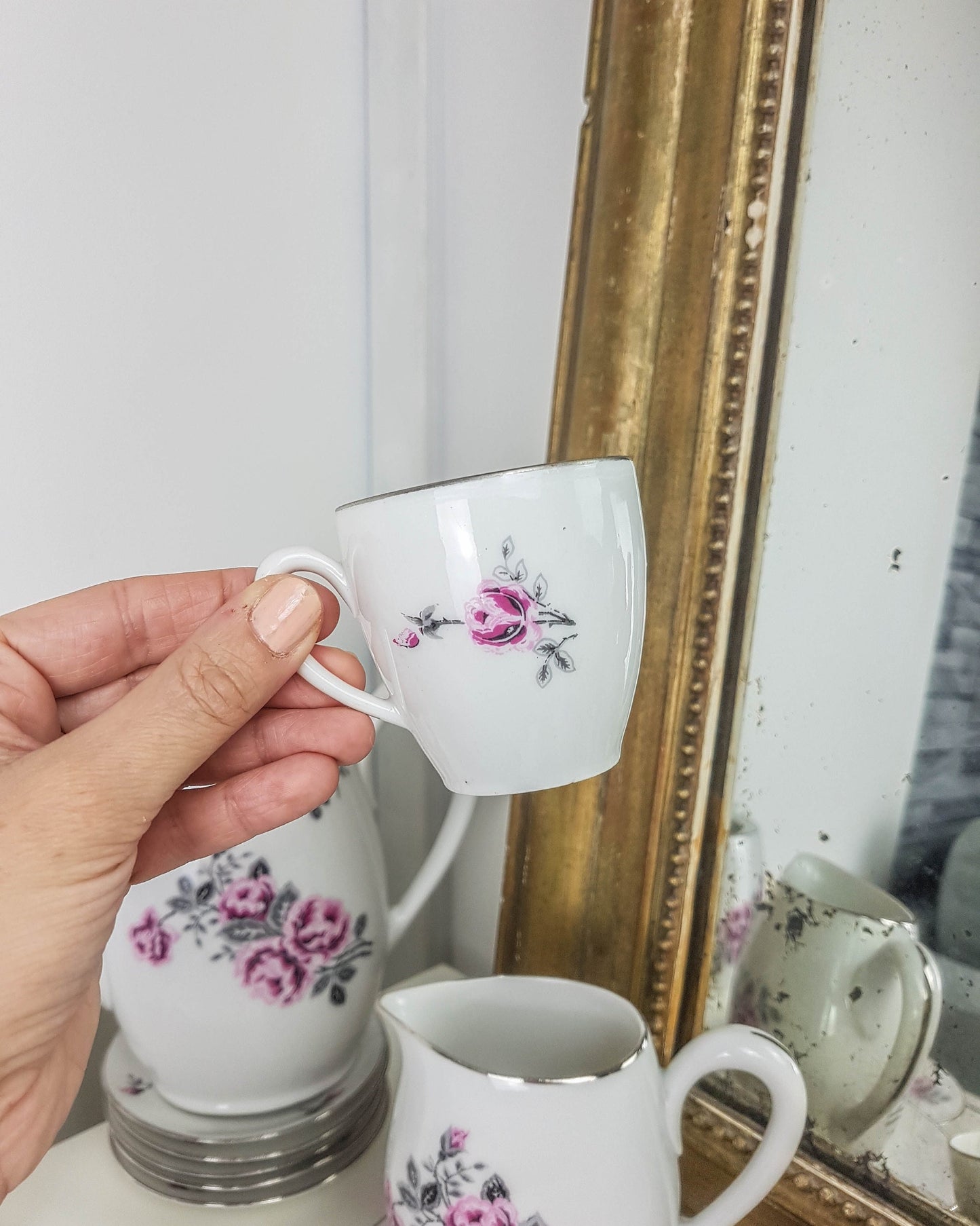 White porcelain tea set with floral pattern