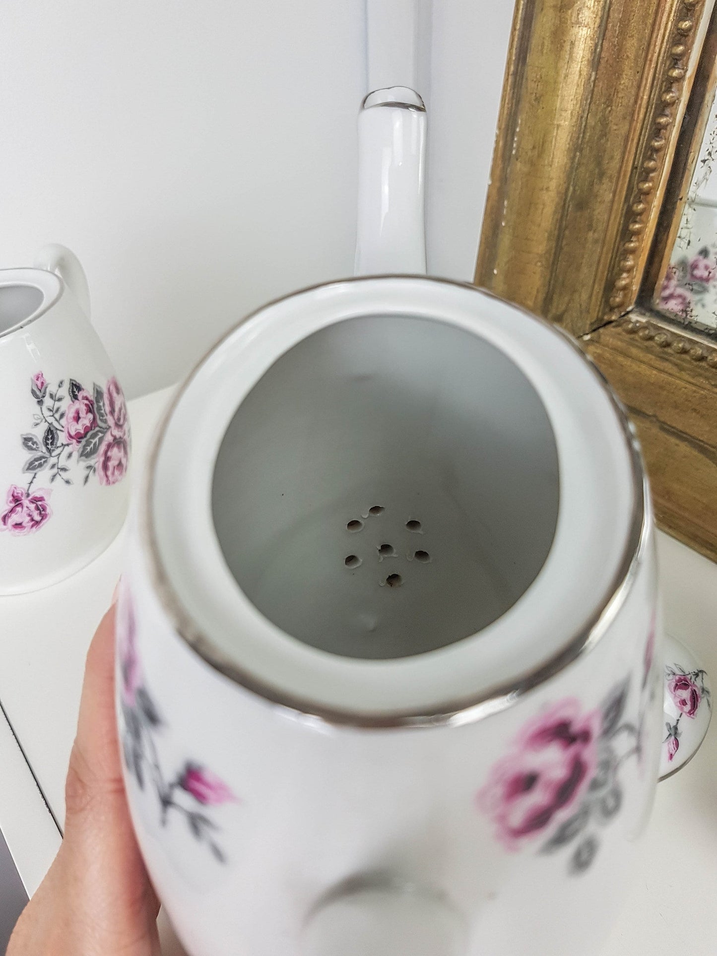 White porcelain tea set with floral pattern