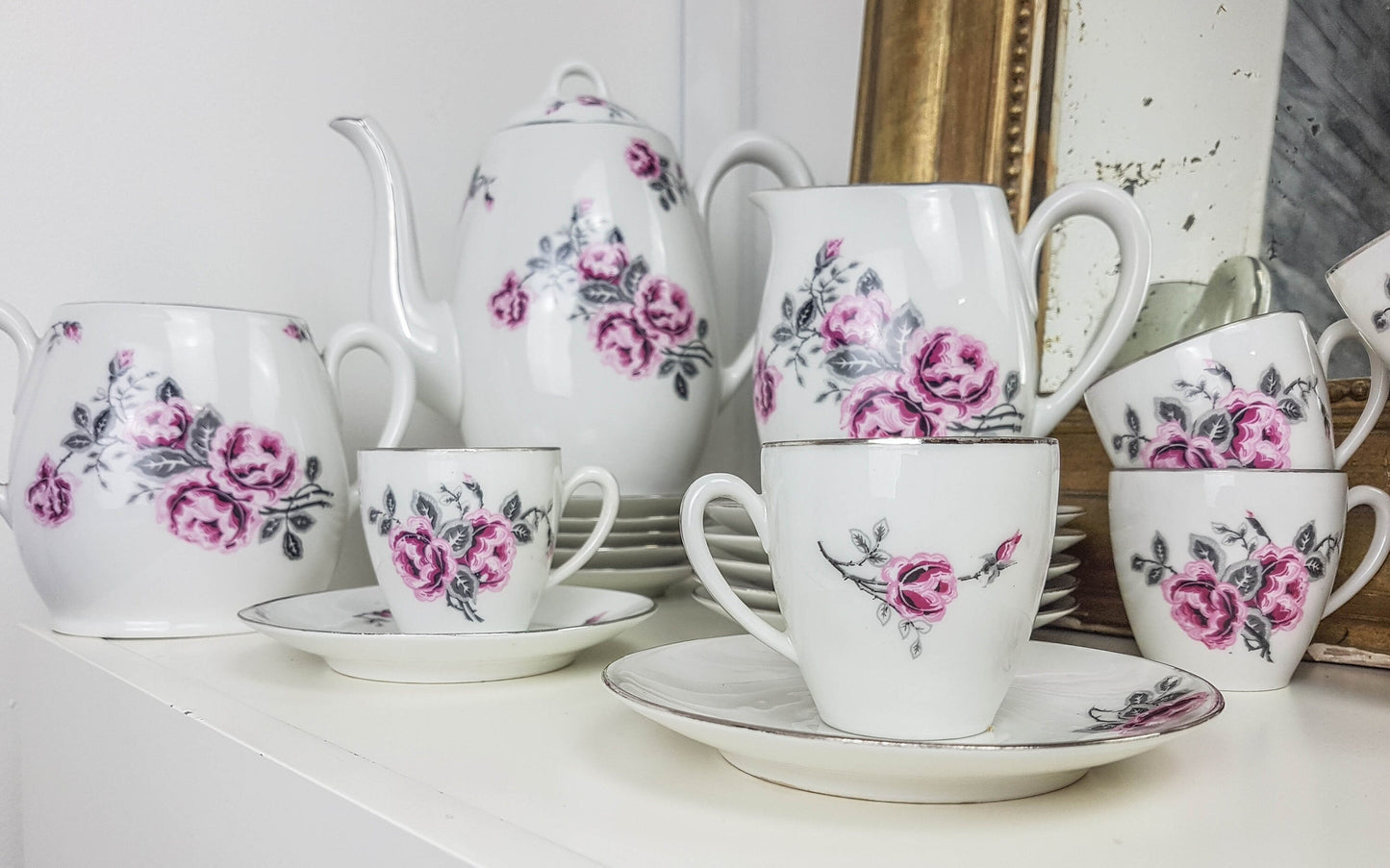 White porcelain tea set with floral pattern