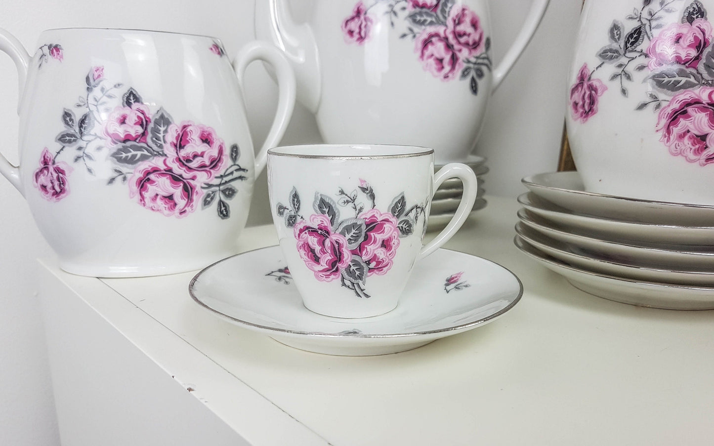 White porcelain tea set with floral pattern