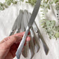 7 Couteaux vintages inox style Art déco made in France