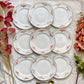 9 Petites assiettes vintage Moulin des Loups motif fleuries orange