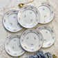 Lot de 6 petites assiettes en porcelaine vintage de Salins, décor floral bleu et rose, dorure.