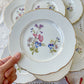 7 Petites Assiettes en porcelaine vintage motif fleuri KG Luneville