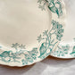 Lot de 6 assiettes plates anciennes en Terre de Fer, modèle 'Lilas' de la manufacture Longchamp – faïence blanche à décor floral bleu, France, fin XIXe siècle