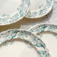Lot de 6 assiettes plates anciennes en Terre de Fer, modèle 'Lilas' de la manufacture Longchamp – faïence blanche à décor floral bleu, France, fin XIXe siècle