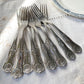 10 Fourchettes vintage en métal style Rocaille