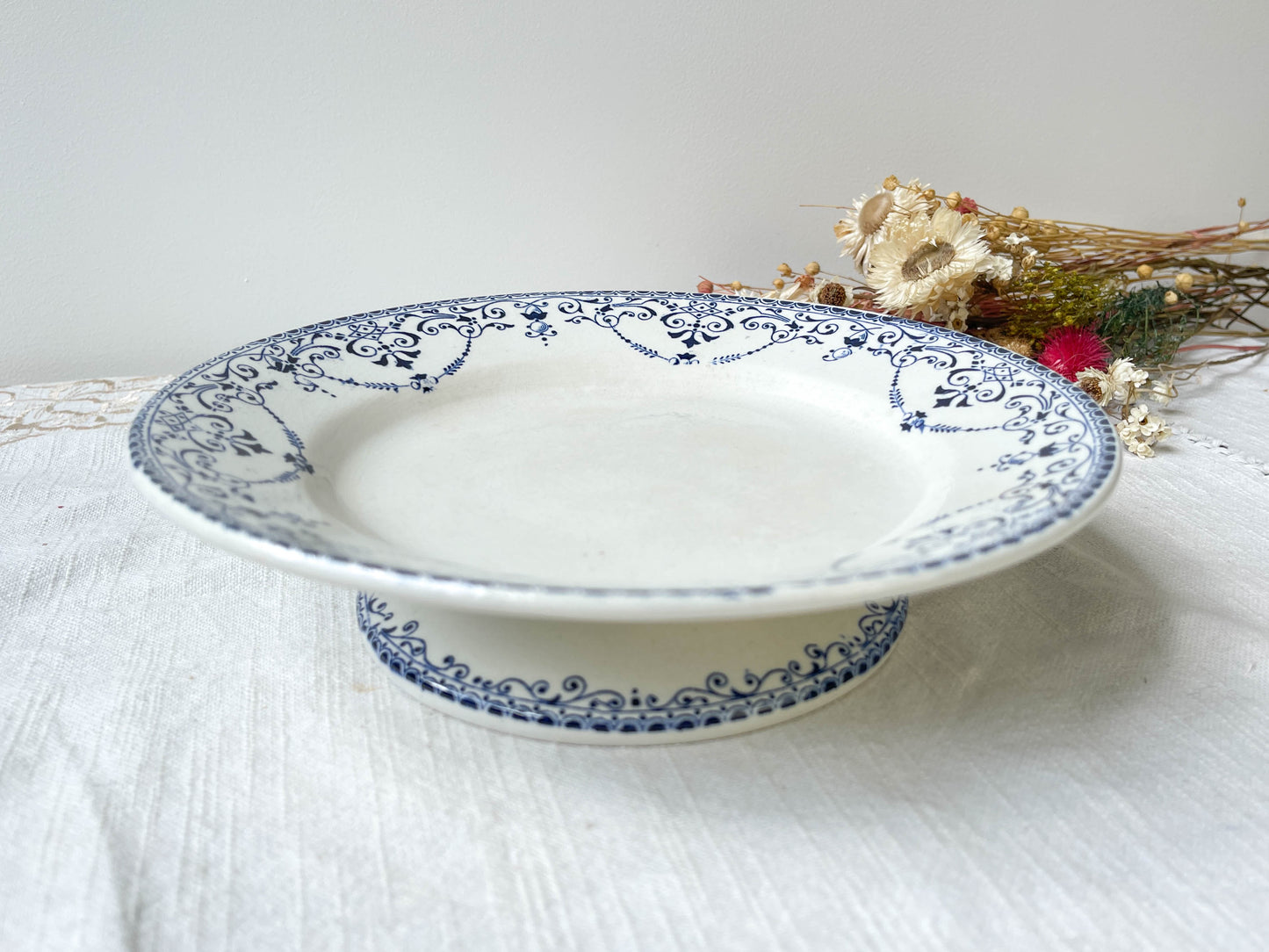 Plat piédouche vintage Terre de fer bleue Français