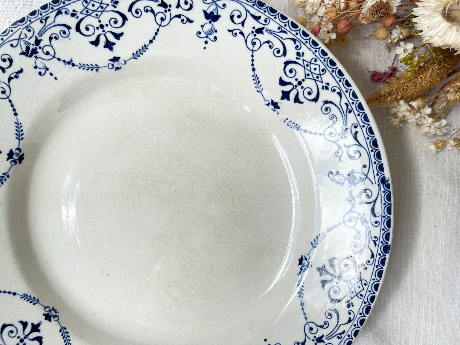 Plat piédouche vintage Terre de fer bleue Français