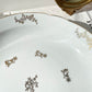 Plat creux en porcelaine blanche dorée J&Ciem France 1950 motif fleuri