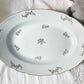 Plat oval en porcelaine blanche dorée J&Ciem France 1950 motif fleuri