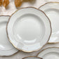 Ensemble de 6 assiettes creuses vintage en porcelaine blanche avec décor doré géométrique SPF, vaisselle ancienne élégante pour table rétro ou collection.