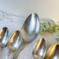Ensemble de 8 cuillères à soupe vintage en métal argenté