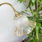 détails lampes de bureau anciennes, style Art Déco, col de cygne en laiton doré avec tulipe en verre, lampe articulée vintage