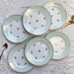 Petites assiettes vintage porcelaine blanche verte fleurie SALINS 66 de 1950s