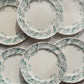 Lot de 6 assiettes plates anciennes en Terre de Fer, modèle 'Lilas' de la manufacture Longchamp – faïence blanche à décor floral bleu, France, fin XIXe siècle