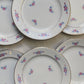 Lot de 6 petites assiettes en porcelaine vintage de Salins, décor floral bleu et rose, dorure.