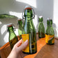 Petites bouteilles en verre bouchon porcelaine Bulach 1950